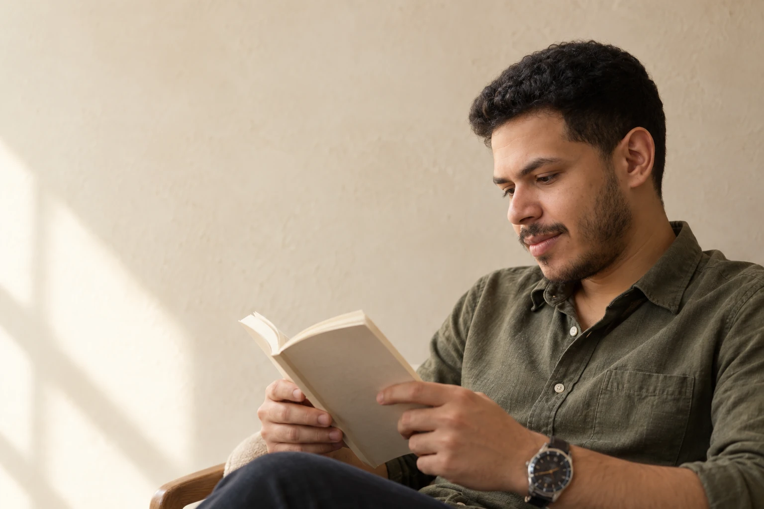 Youssef reading a book
